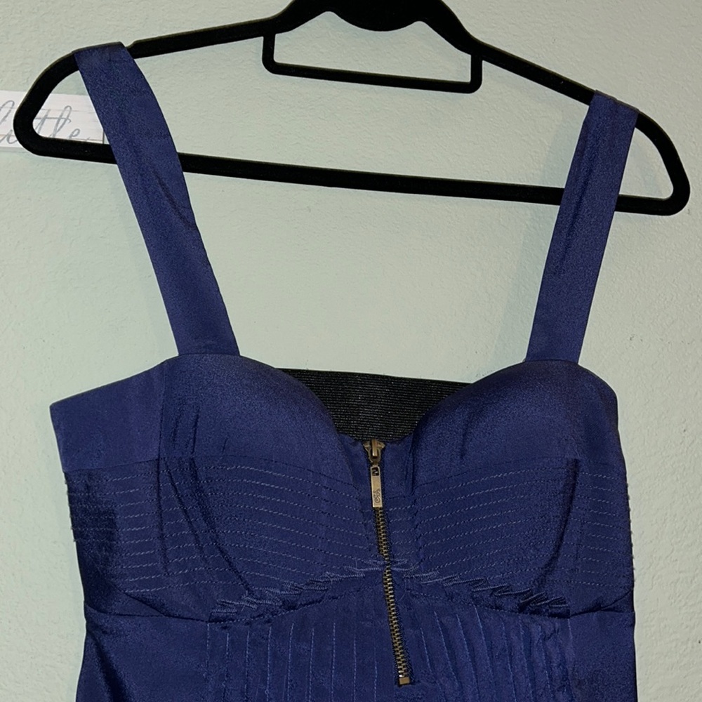 Beautiful Dark blue. Material is nice and soft. Gorgeous details.